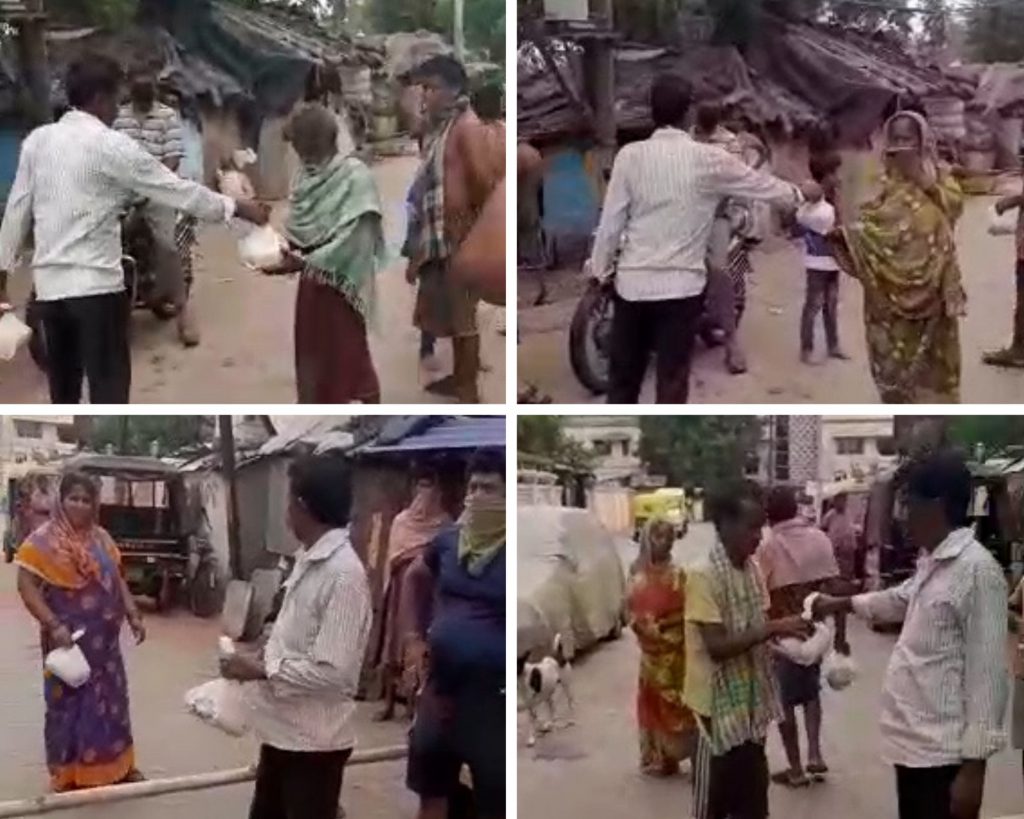 KIIT-Staff-Donating-food-to-SLums